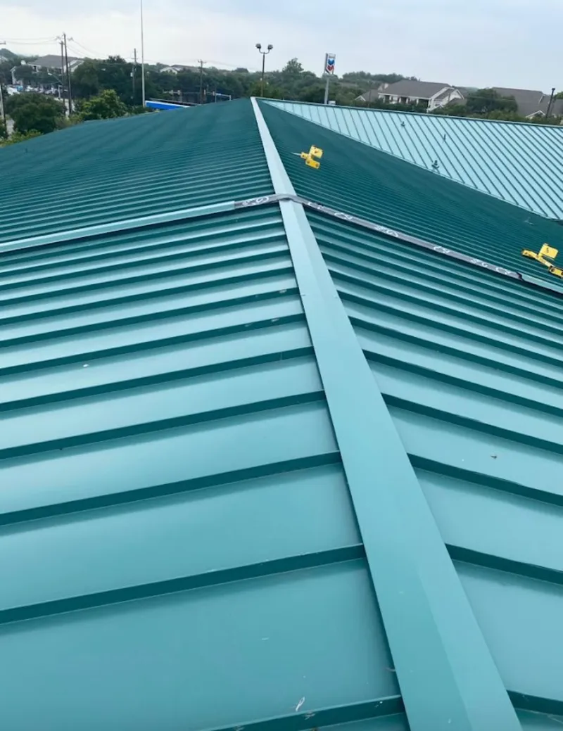 Green commercial metal roof ridge and valley for Metal Roof Repair in Forney